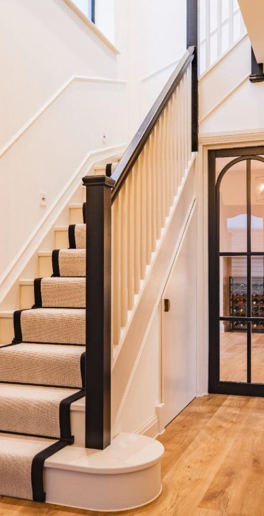 Renovated staircase in house renovation by Design Development associates
